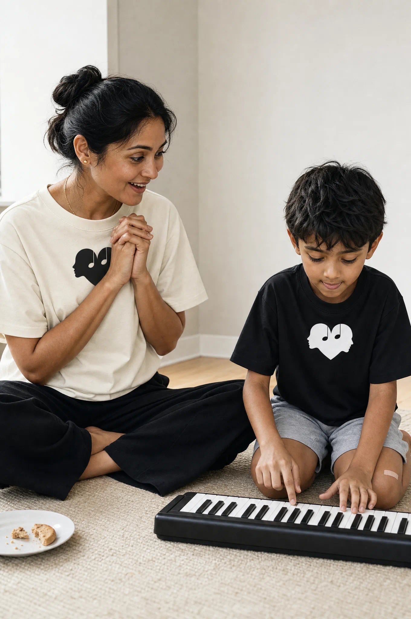 Woman and a child in Alabaster and Piano Overture Oversized Tees