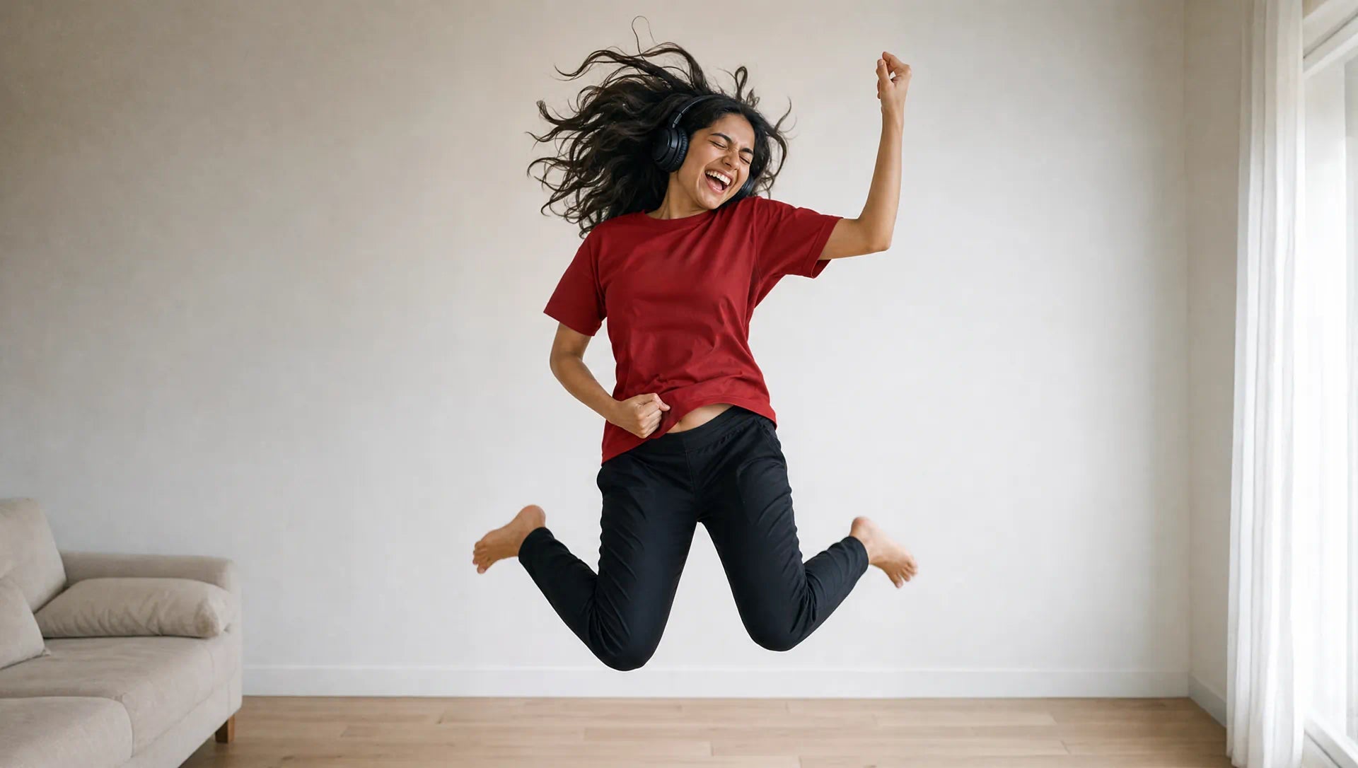 Woman playing air guitar in a plain crimson tee without The Symbol