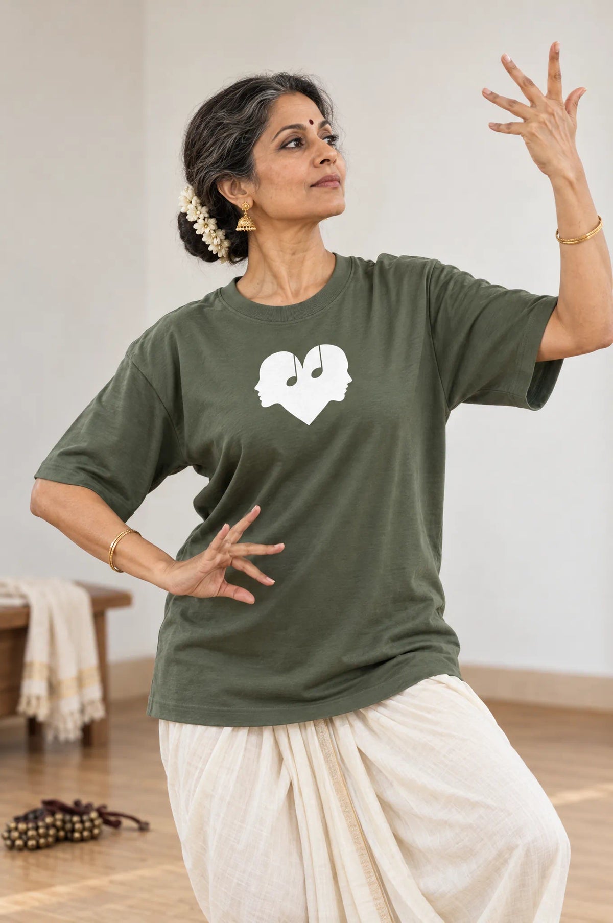 Woman in classical dance in the Juniper green Overture Oversized Tee