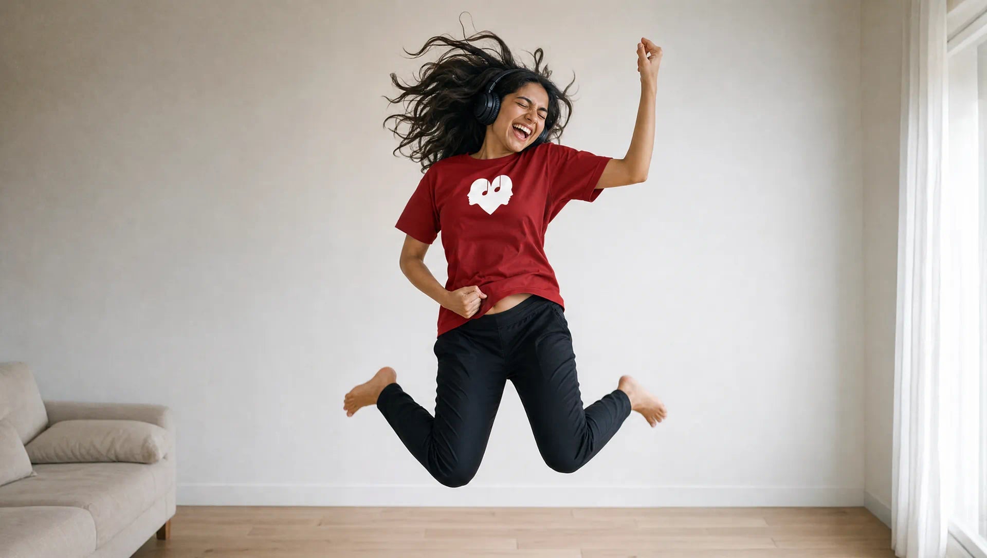 Woman playing air guitar in the Crimson Overture Tee with The Symbol on the chest