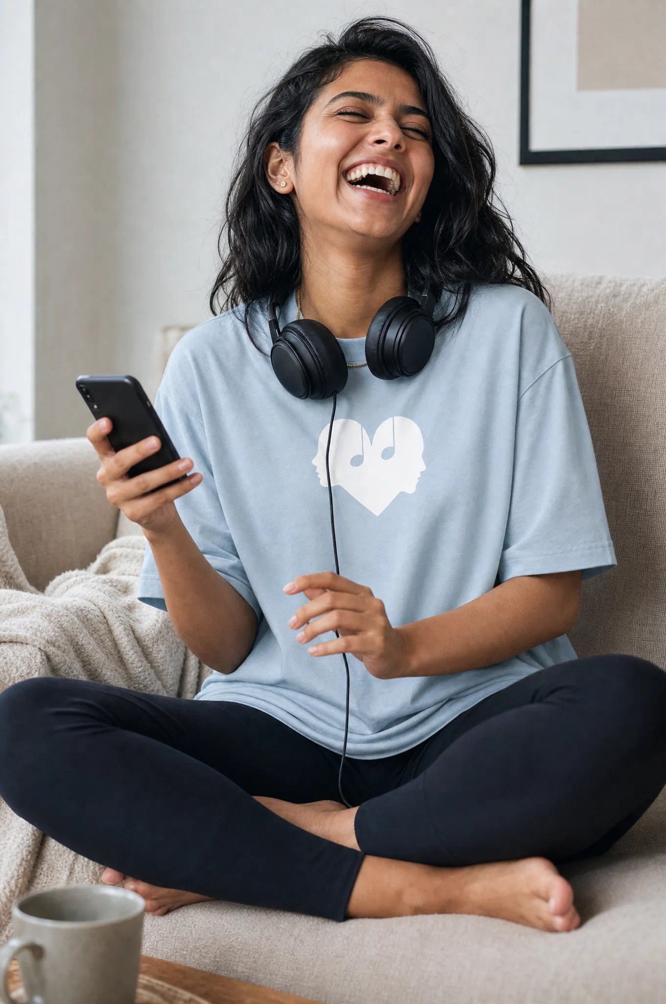 Woman laughing in the Horizon blue Overture Oversized Tee